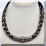 J124. Sterling silver and leather multistrand choker necklace. Signed YV. - $48 